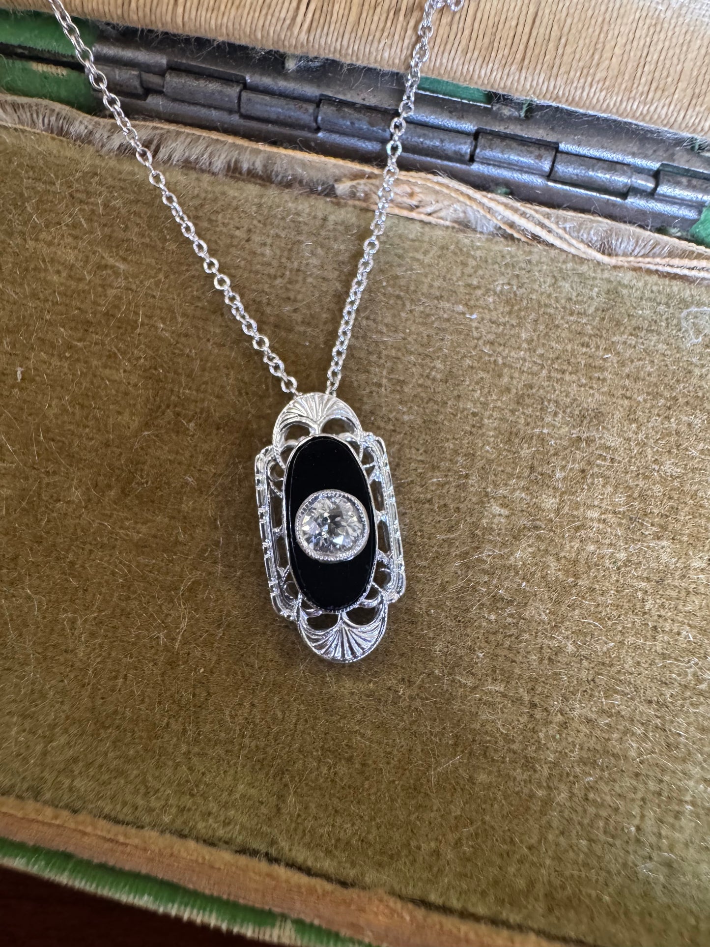 Antique black onyx and diamond pendant