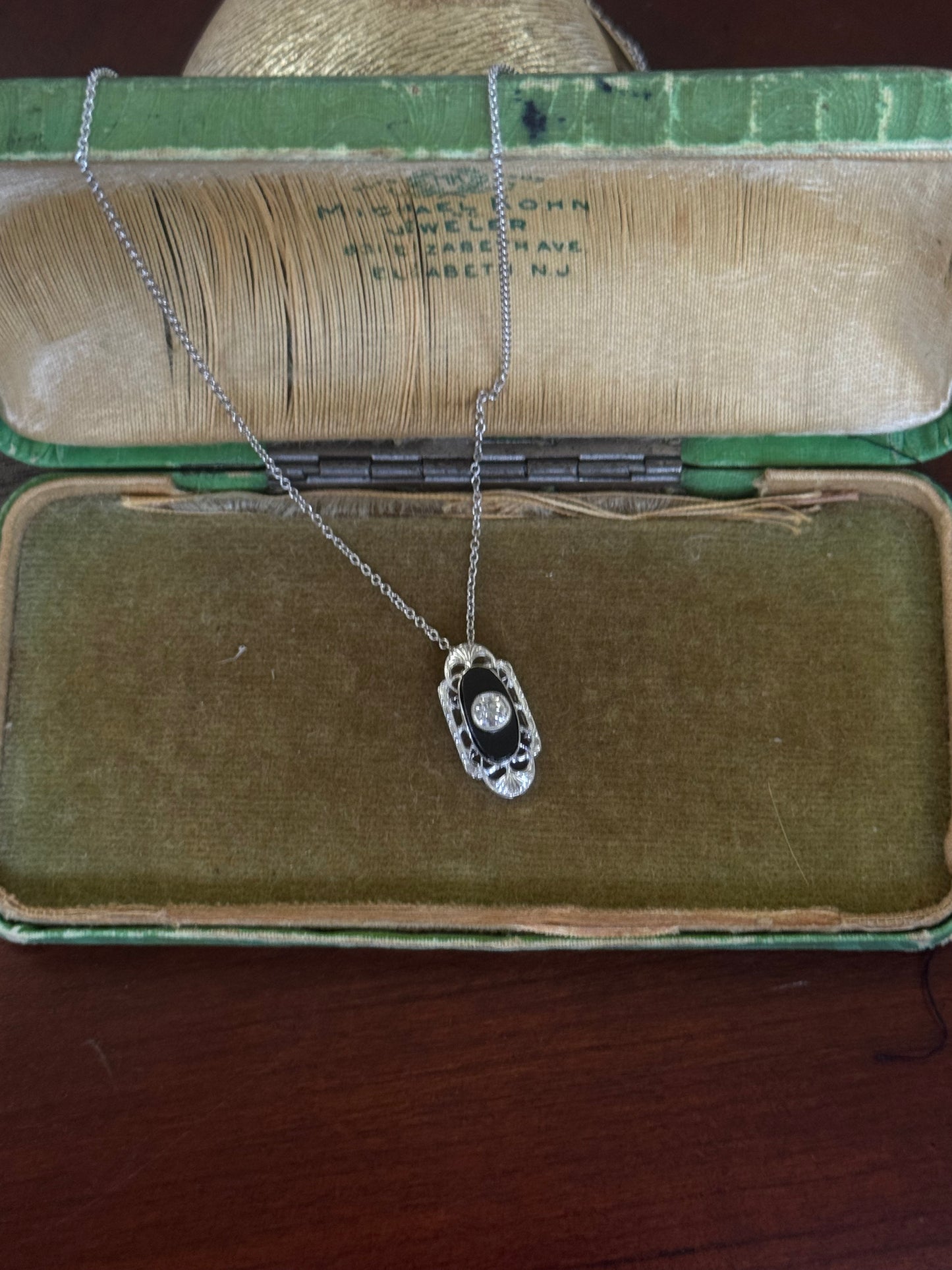 Antique black onyx and diamond pendant