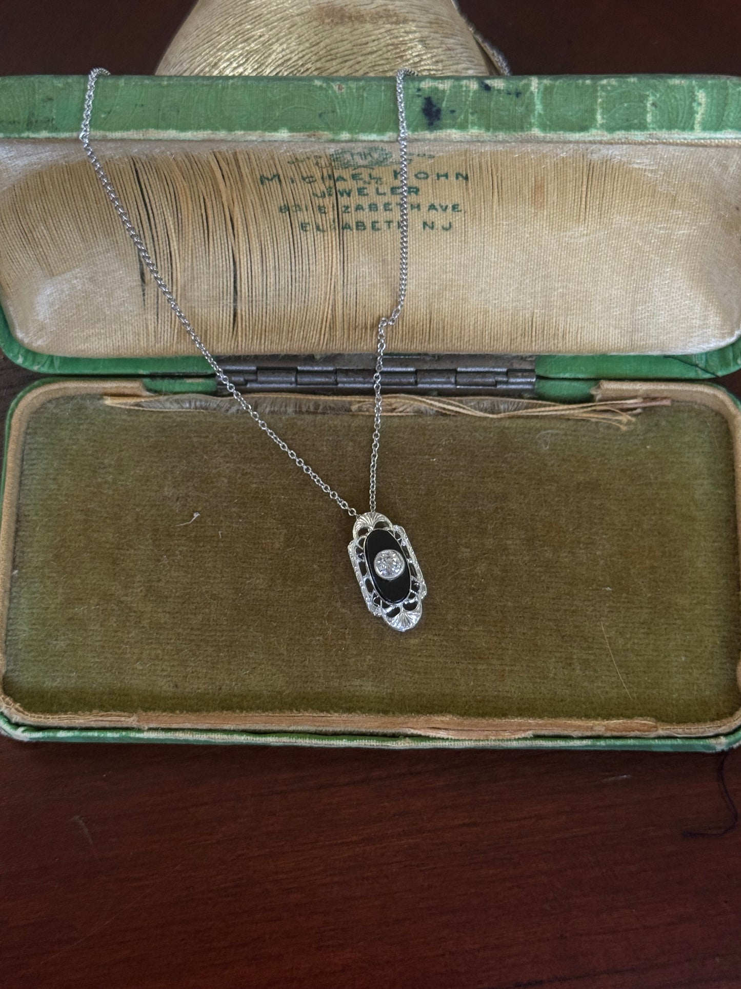 Antique black onyx and diamond pendant