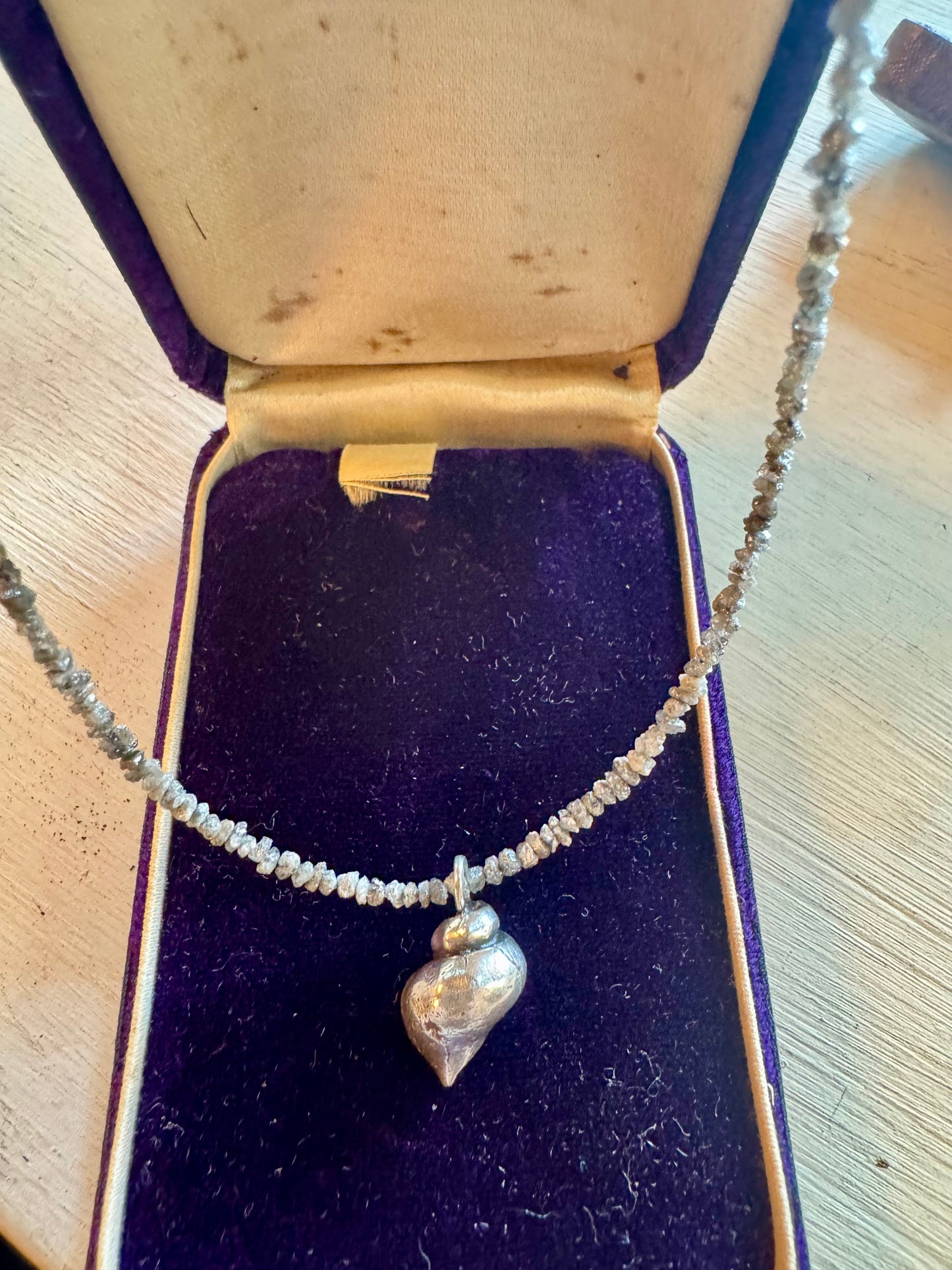 Sterling shell and ruff cut diamond necklace