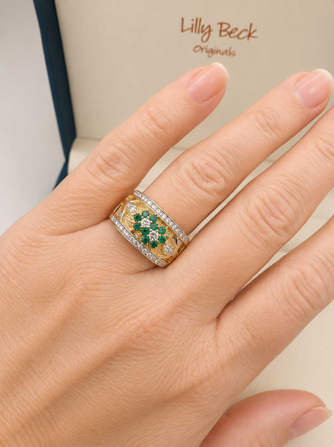 Stunning vintage emerald and diamond wide band