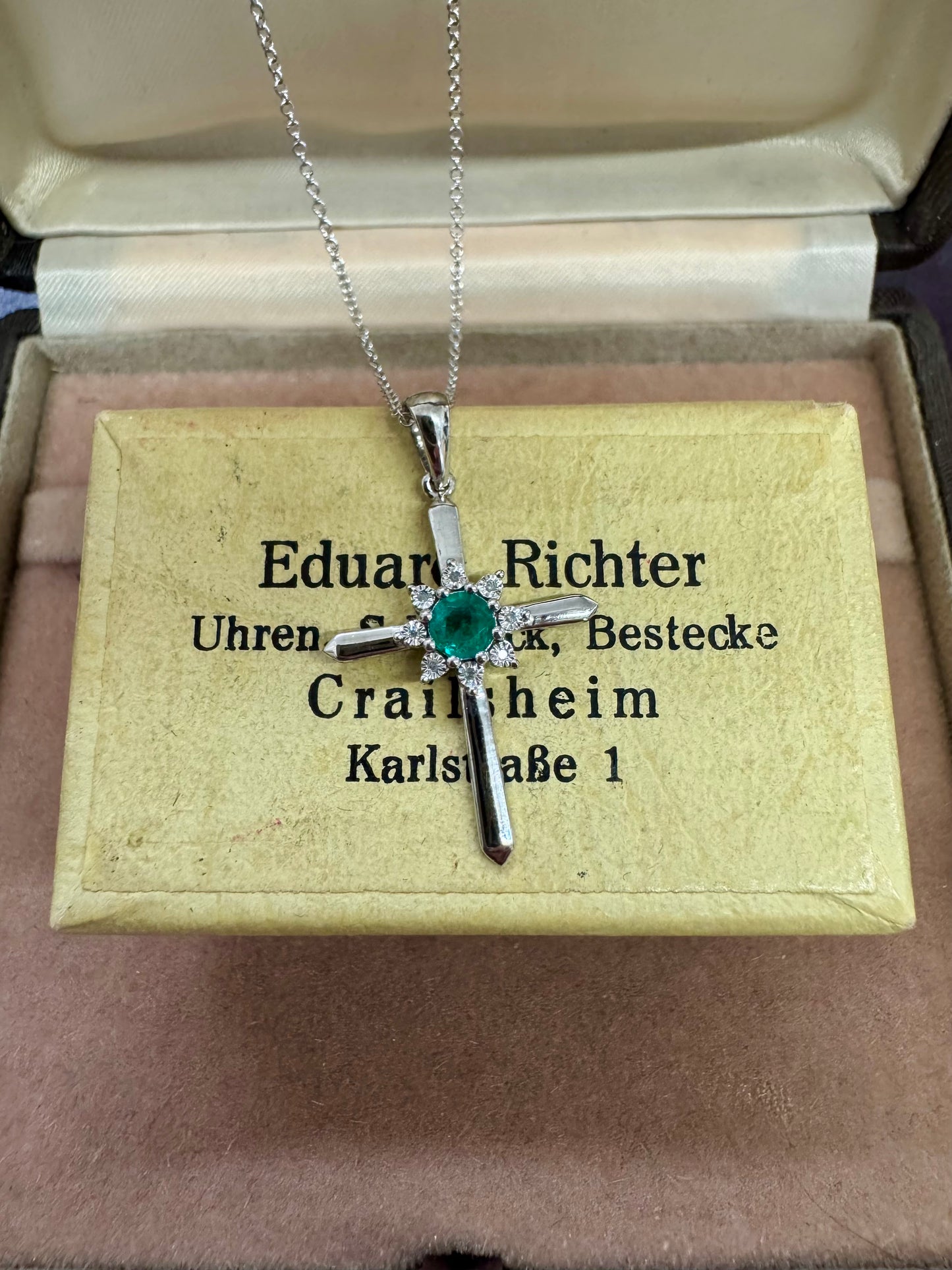 Diamond and emerald cross