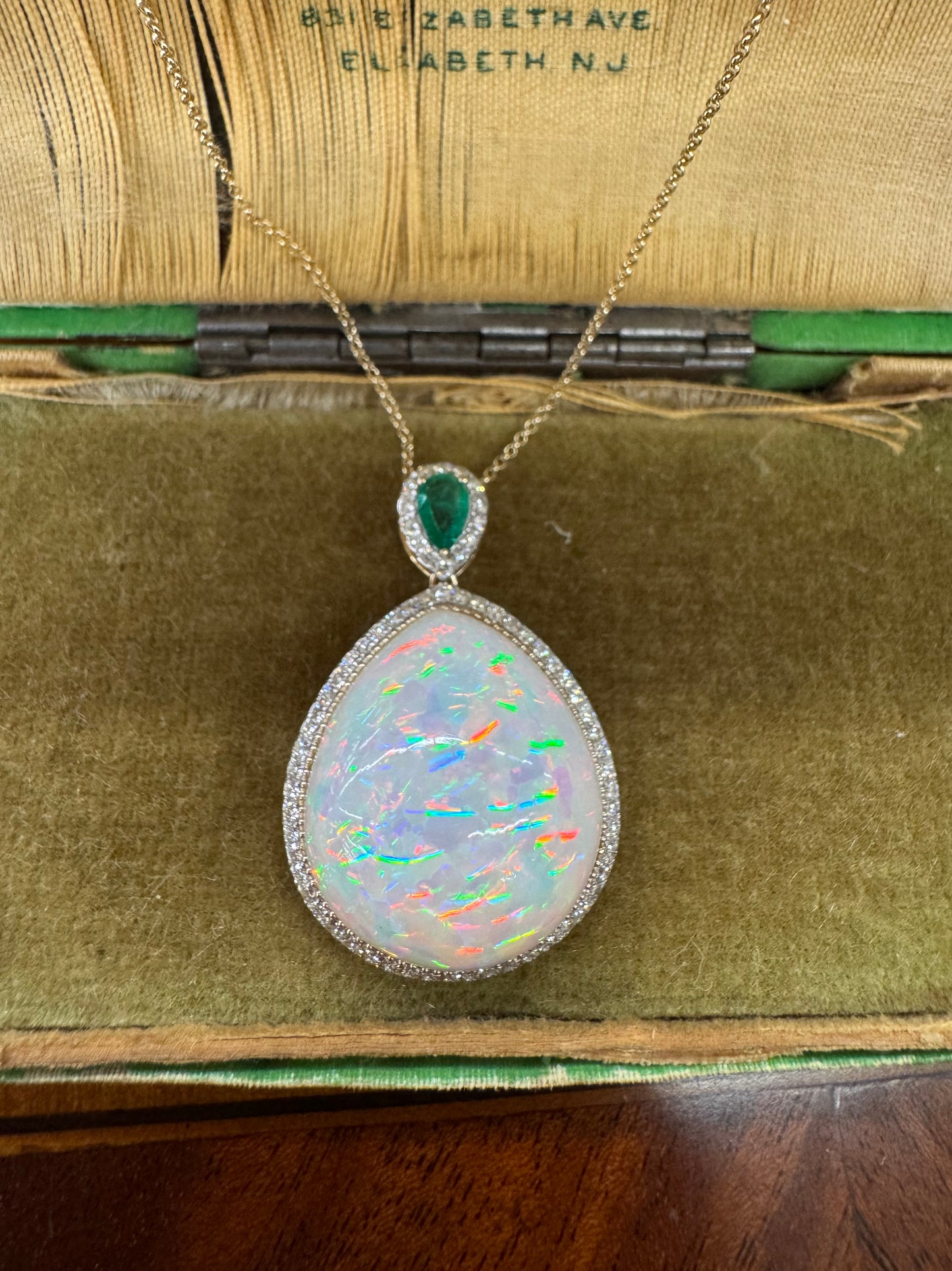 22.5ct Opal, Emerald  and Diamond Pendant
