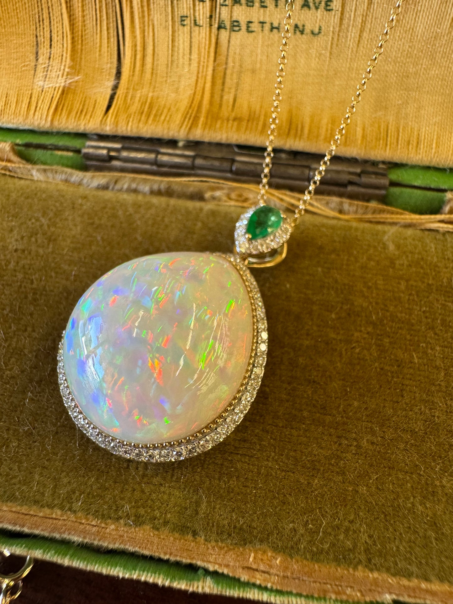 22.5ct Opal, Emerald  and Diamond Pendant