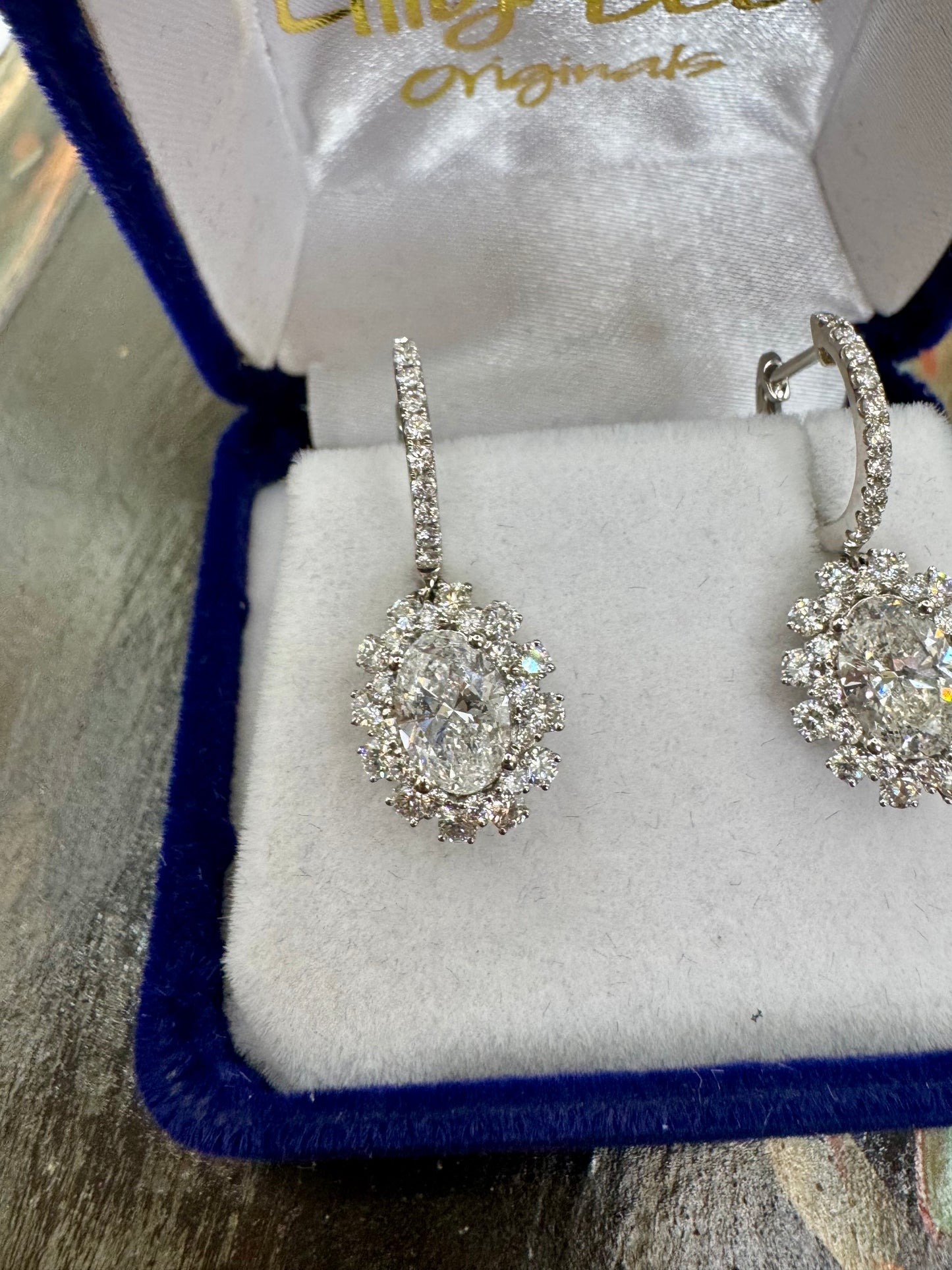 2.00ctw oval Diamond &  1.15ctw Round Diamonds Drop Earrings set in White Gold