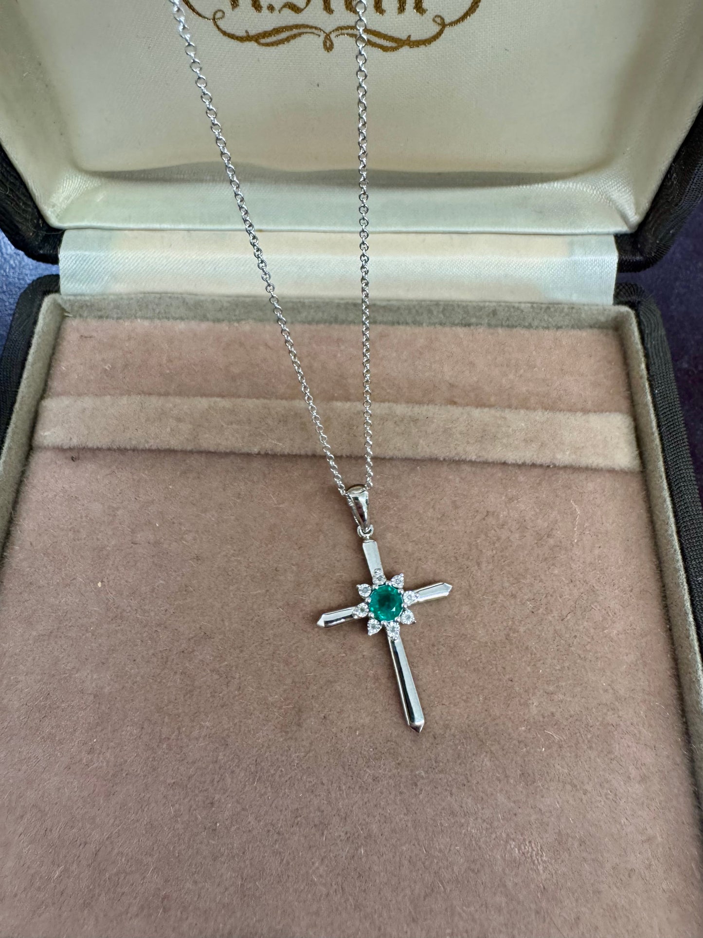 Diamond and emerald cross
