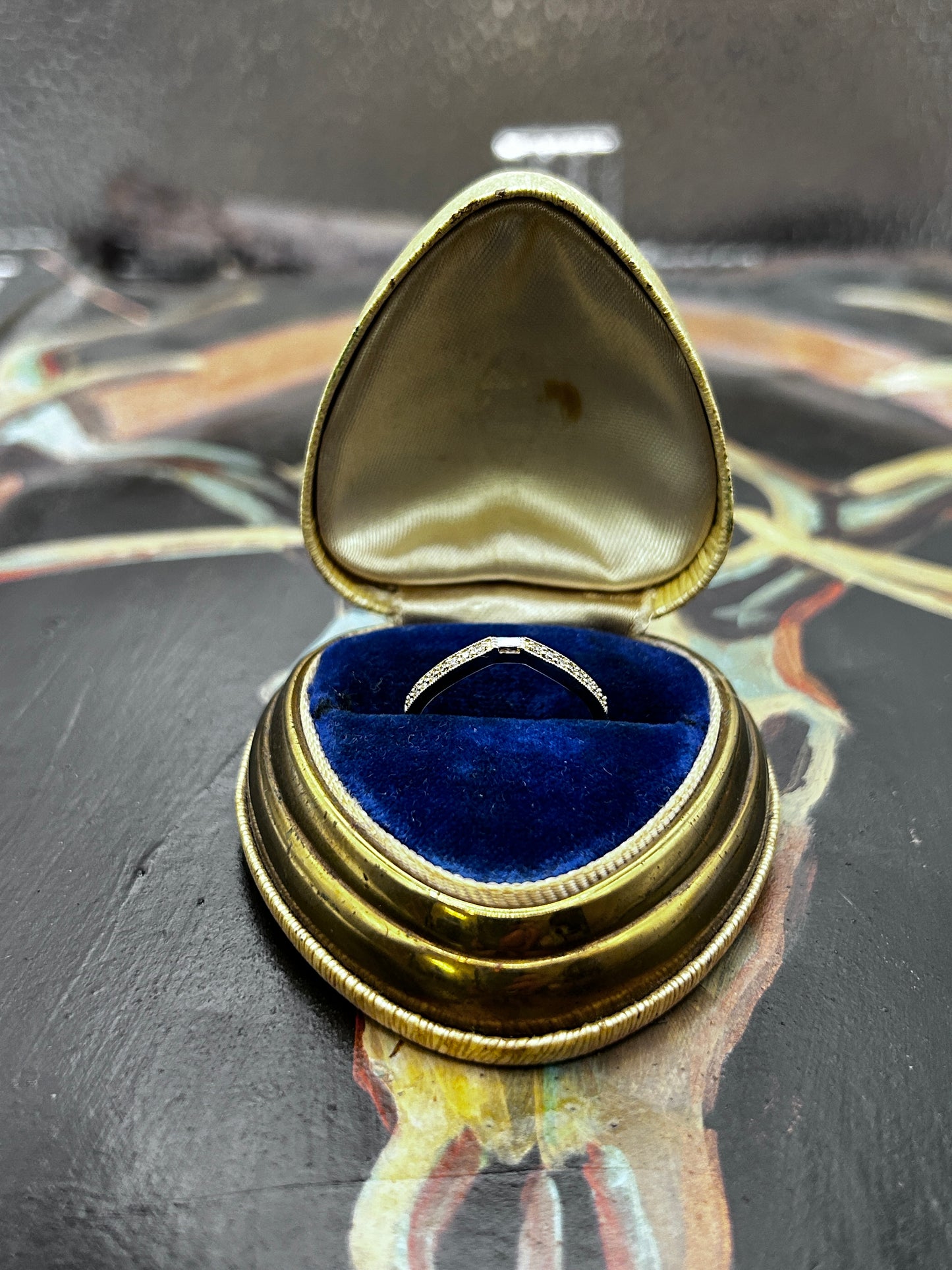 Curved band with .13ct Diamonds set in 14k yellow gold