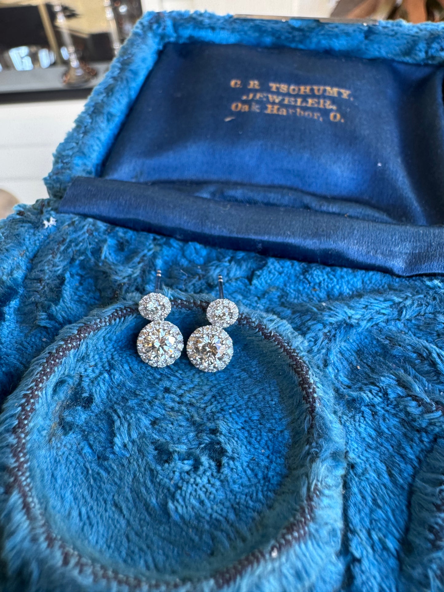 Diamond Drop Halo Earrings set in White Gold