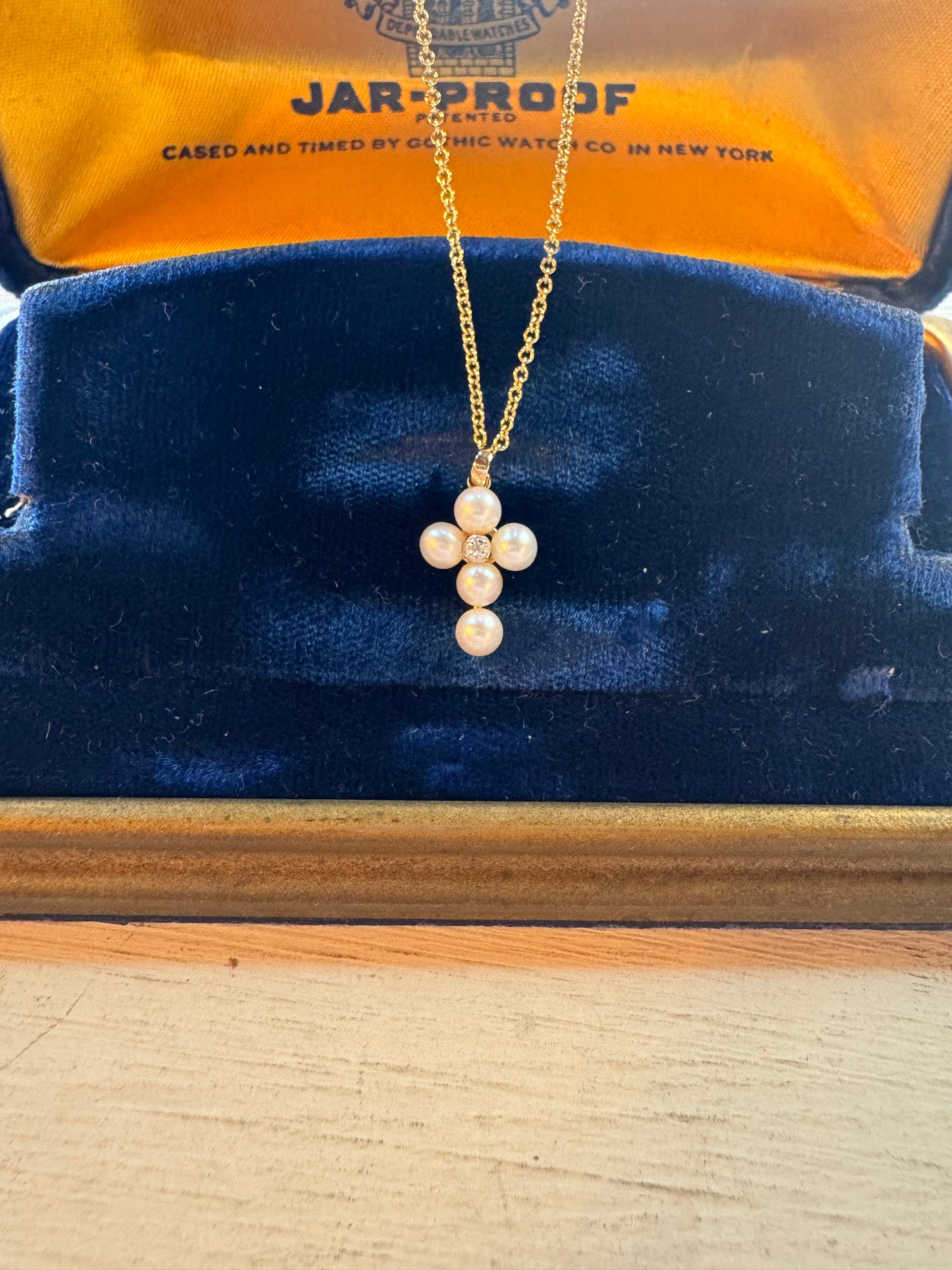 Sweet pearl cross