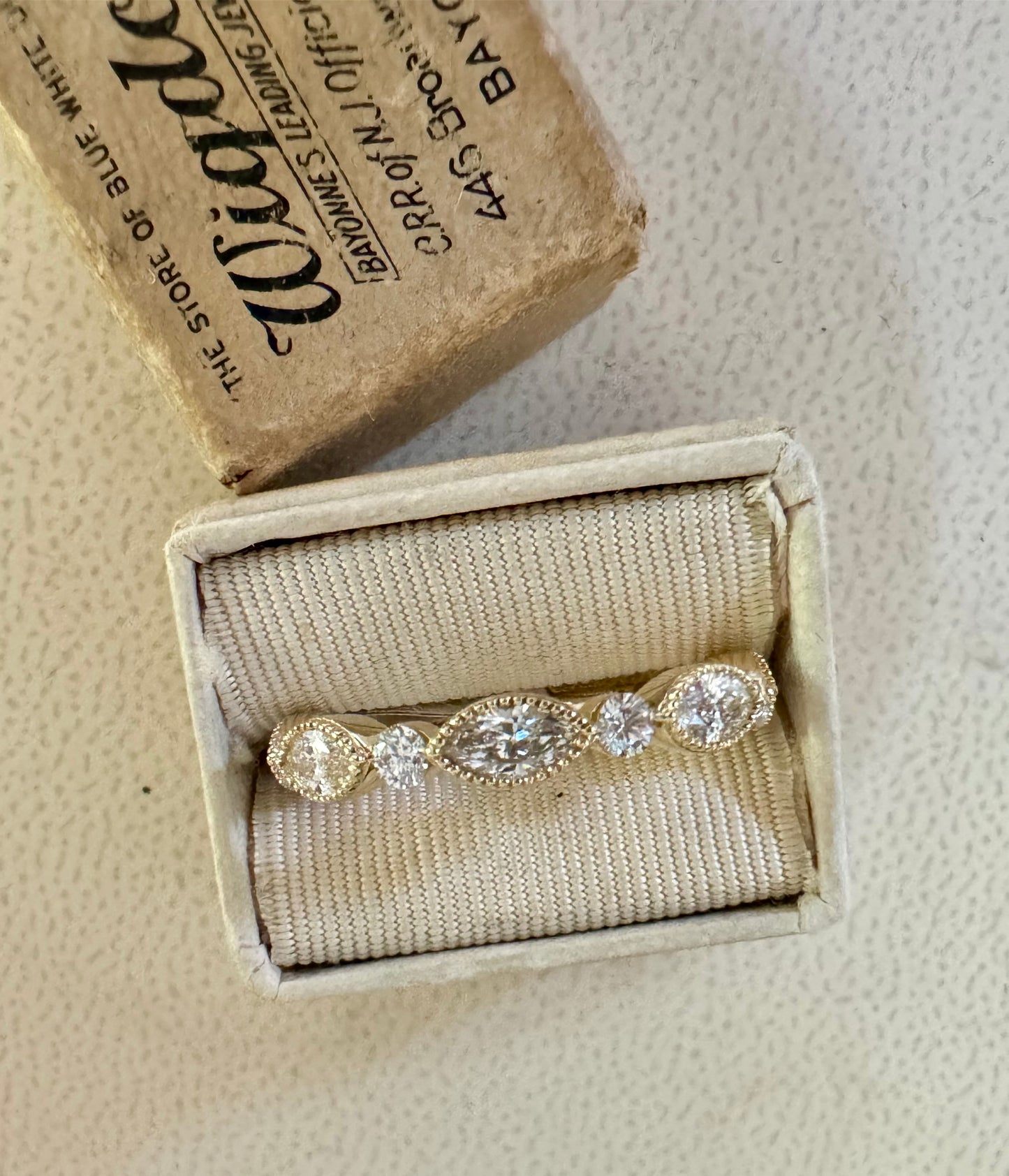 Marquise and round diamond band