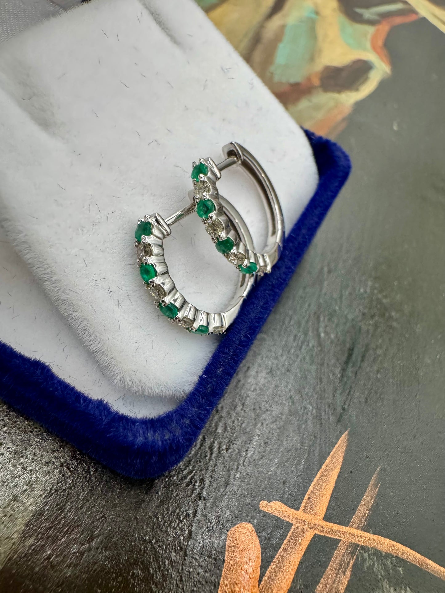 Emerald and Diamond Huggies set in 10k White Gold
