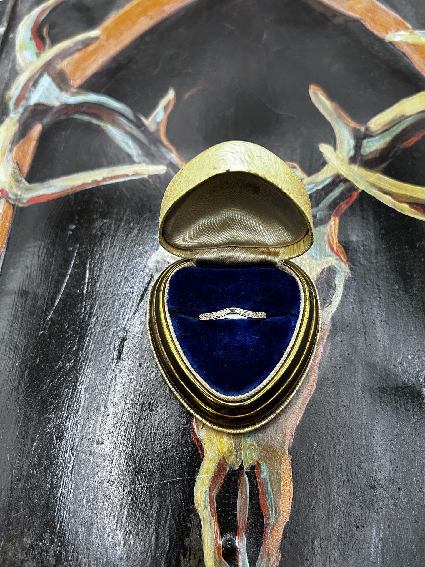 Curved band with .13ct Diamonds set in 14k yellow gold