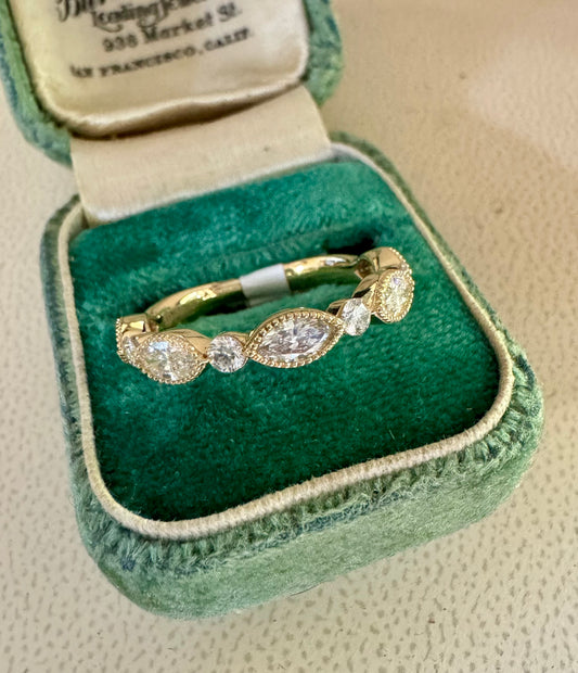 Marquise and round diamond band