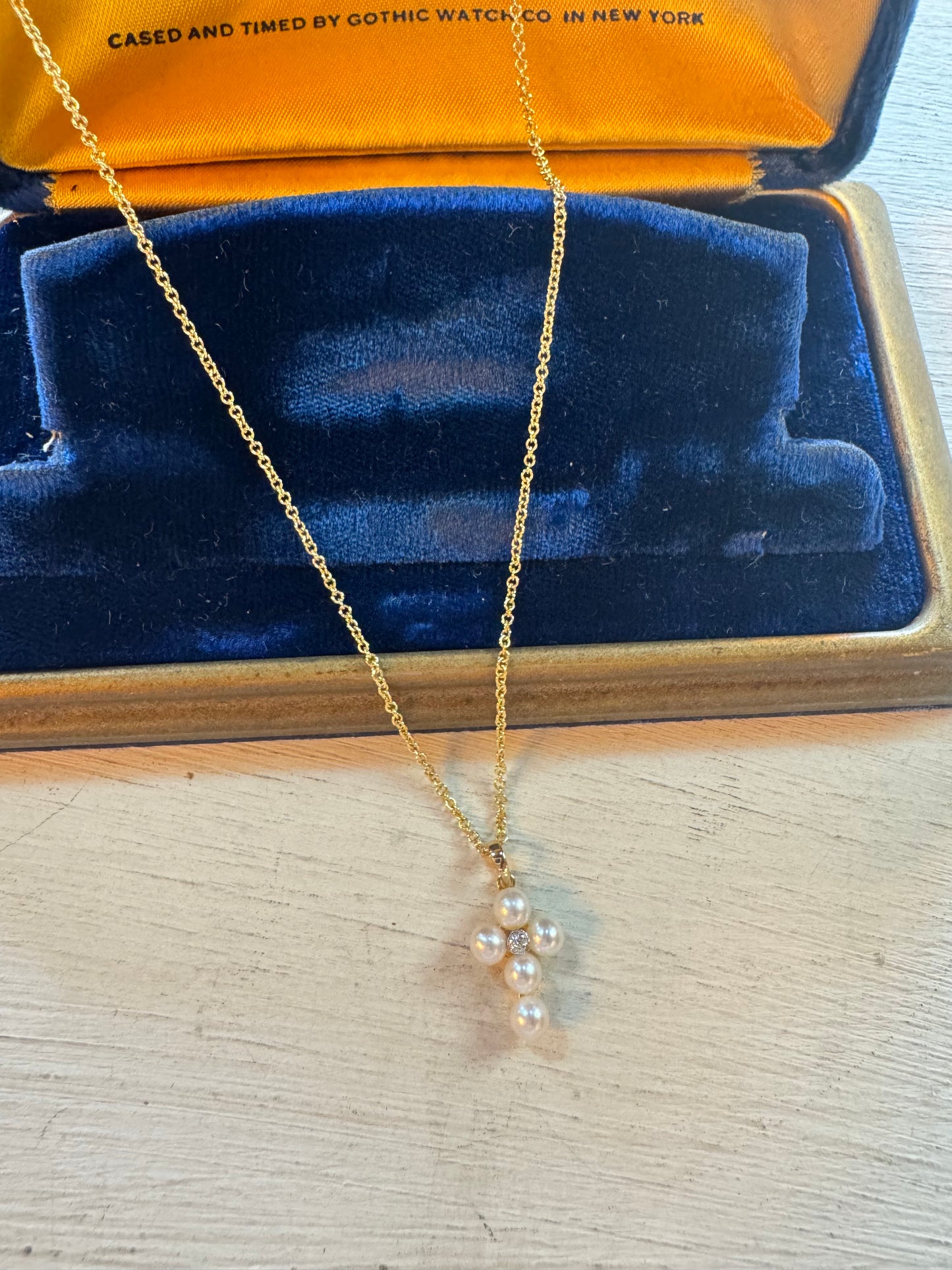 Sweet pearl cross