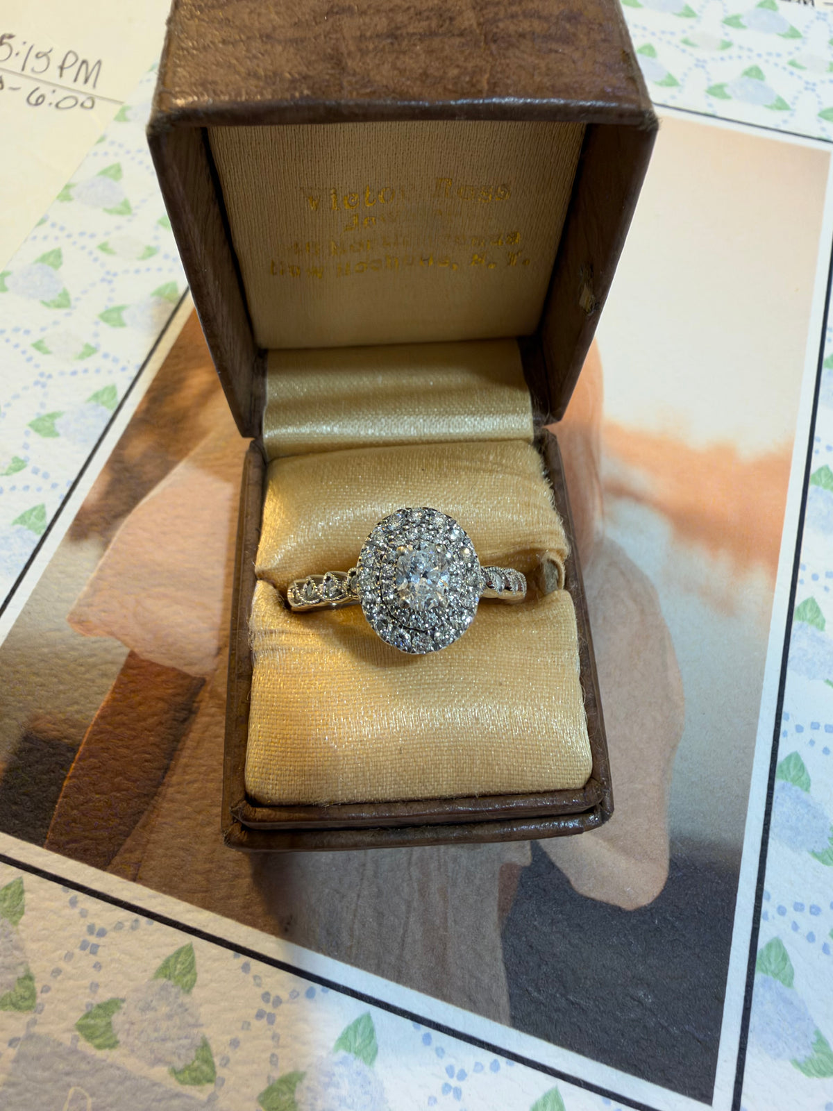 Oval double halo diamond ring