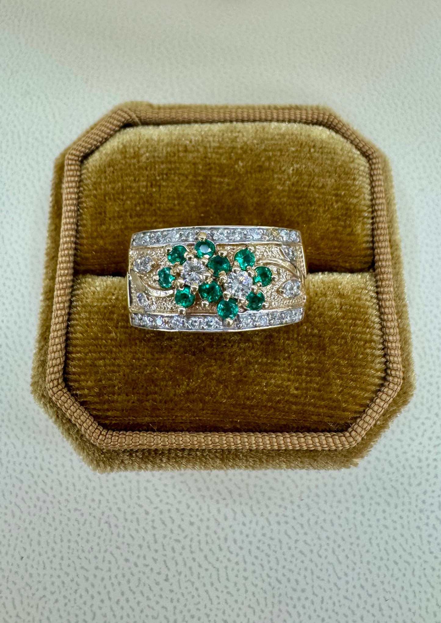 Stunning vintage emerald and diamond wide band