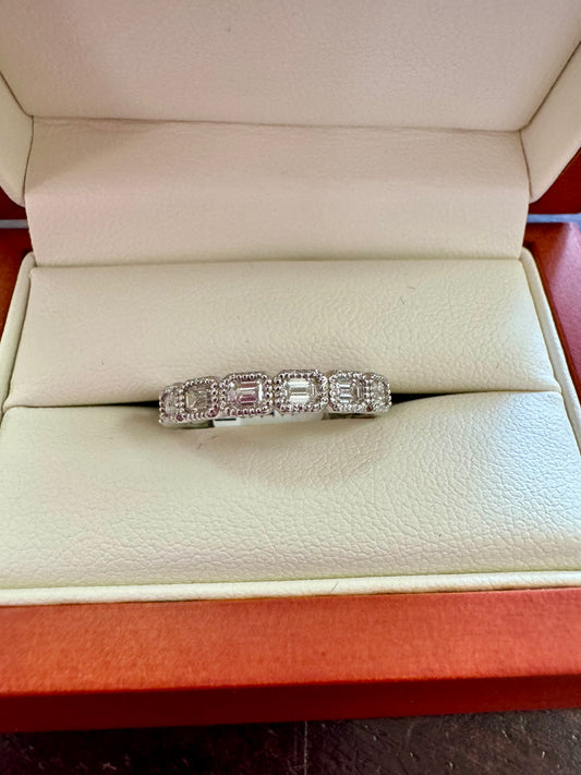 .85ct Emerald cut bezel set designer band