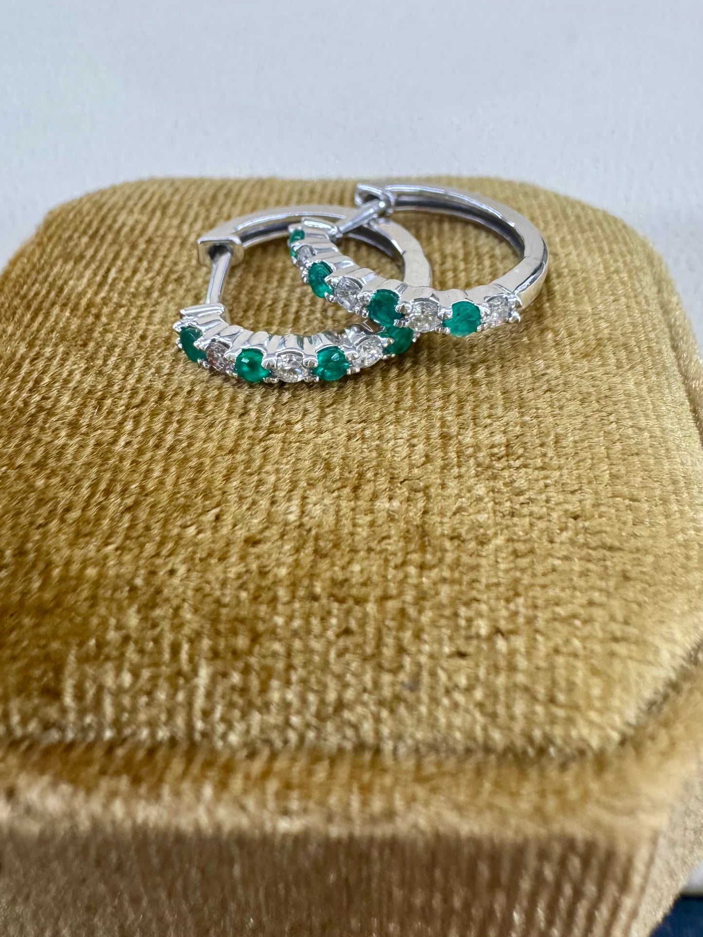 Emerald and Diamond Huggies set in 10k White Gold